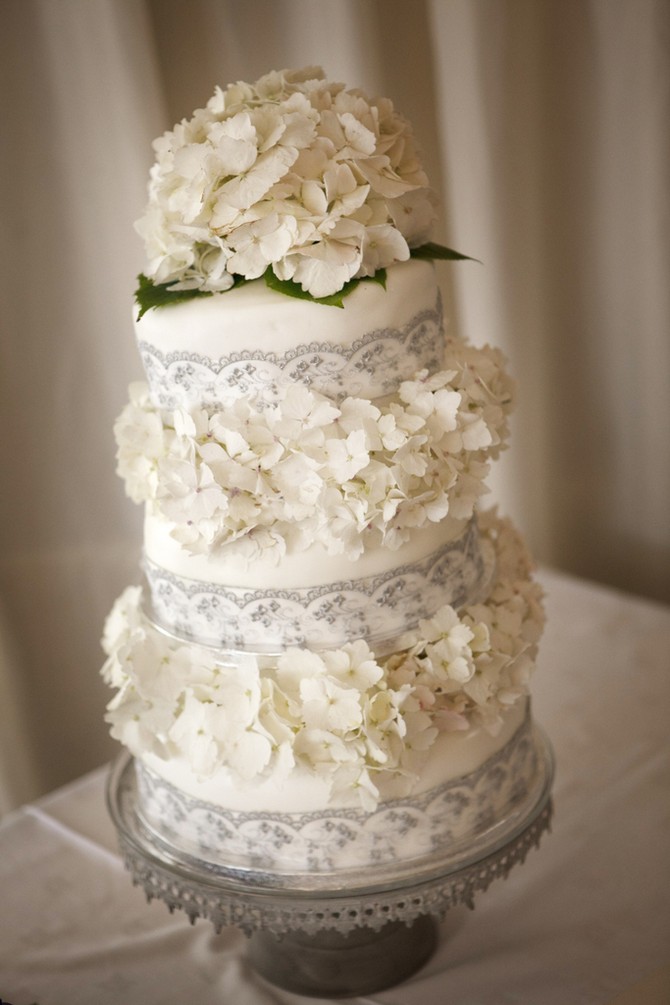 four tier cream wedding cake